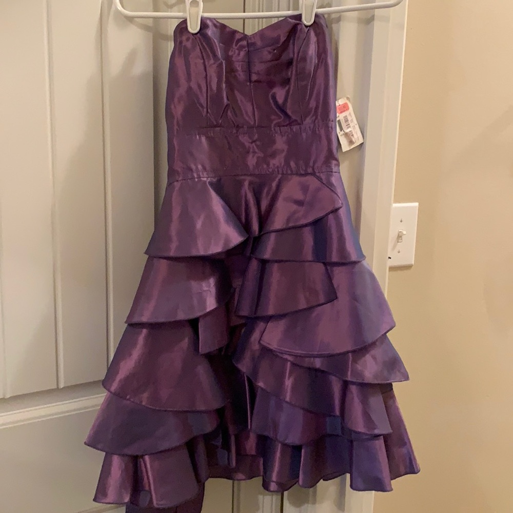 Purple strapless dress.